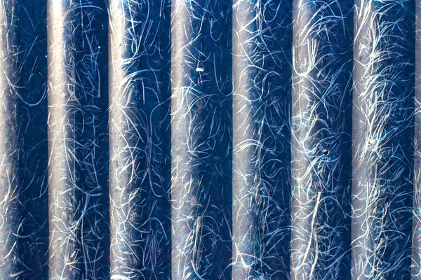 abstraction of blue textolite slate, fiberglass, blue background