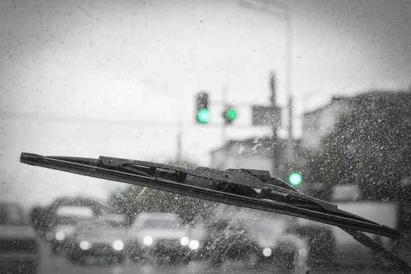 Car windshield wipers in rainy season, black and white photo wit — Stockfoto