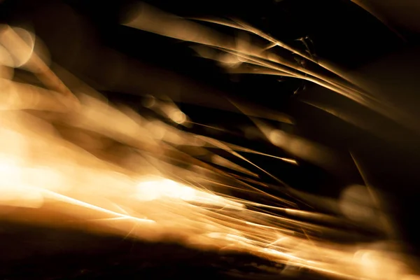 Abstrakte Nahaufnahme von verschwommenen Funken und Rauch aus dem Lichtbogen — Stockfoto