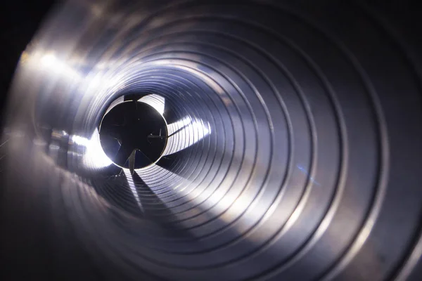 Closeup view from inside the galvanized steel air duct on the ex — 스톡 사진