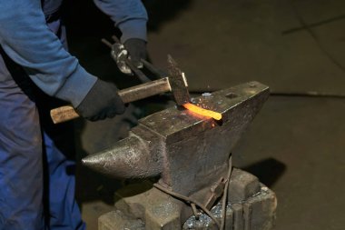 traditional metal forging in a forge