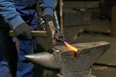 traditional metal forging in a forge