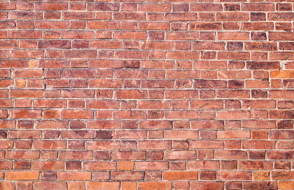background, texture of a solid vintage red brick wall
