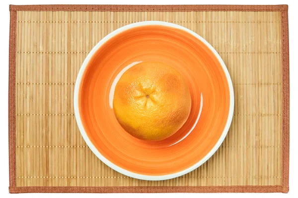 Color Bodegón Pomelo Amarillo Rosado Plato Naranja Una Mesa Caña — Foto de Stock