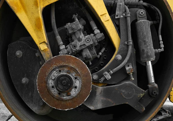 Industrieller Hintergrund Nahaufnahme Straßenverdichter Hydraulikmotor — Stockfoto