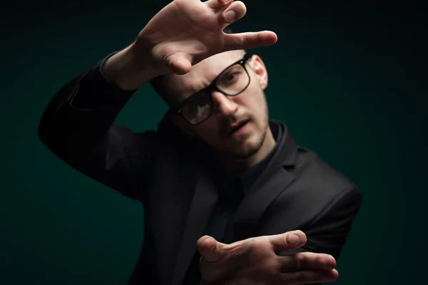 Portrait of a blurred young man in glasses — Stock Photo, Image