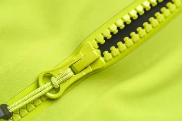 Close-up fragment of a green windbreaker — Stock Photo, Image
