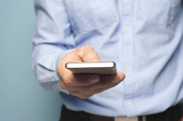 Close-up hand of an unidentified man types