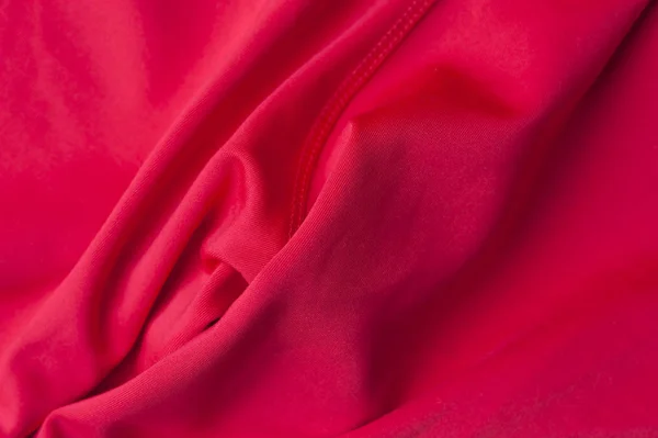 Fragmento de tecido de poliéster vermelho amassado — Fotografia de Stock