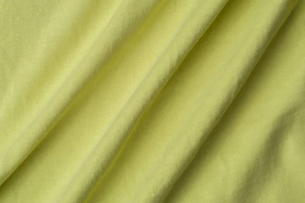 Fragment eines schönen gelben Baumwollgewebes — Stockfoto