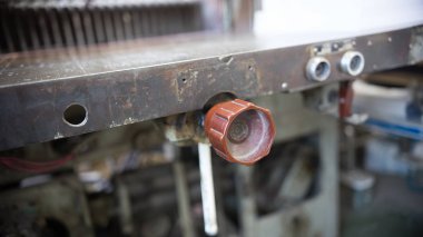 Close up of handle on printing machine