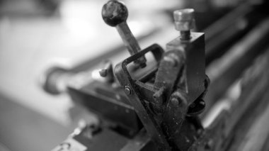 Close-up Industrial Printing Press Puts Silver Paint On The Canvas