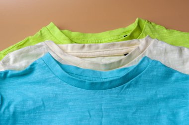 Closeup three knitted t-shirts