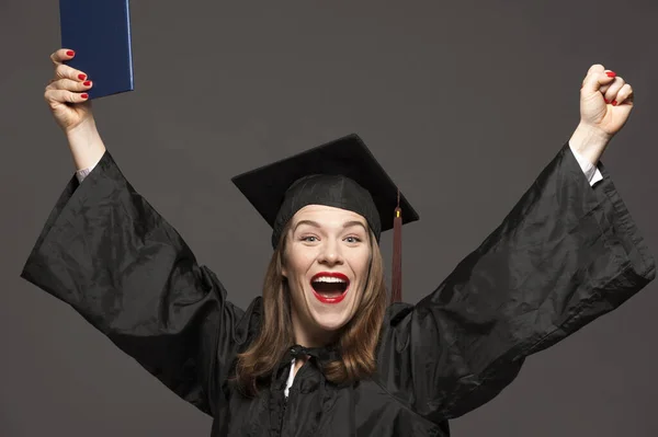 Happy smiling graduate female student — Stock Photo, Image