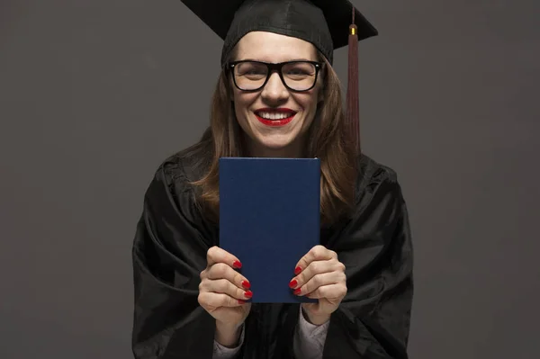 Happy smiling graduate female student with diploma — Stock Photo, Image