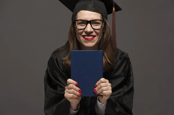 Happy smiling graduate female student with diploma — Stock Photo, Image