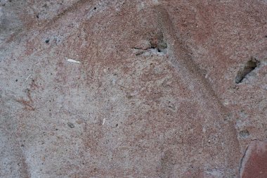 Yakın plan - evin eski cephesinde kahverengi taş duvar