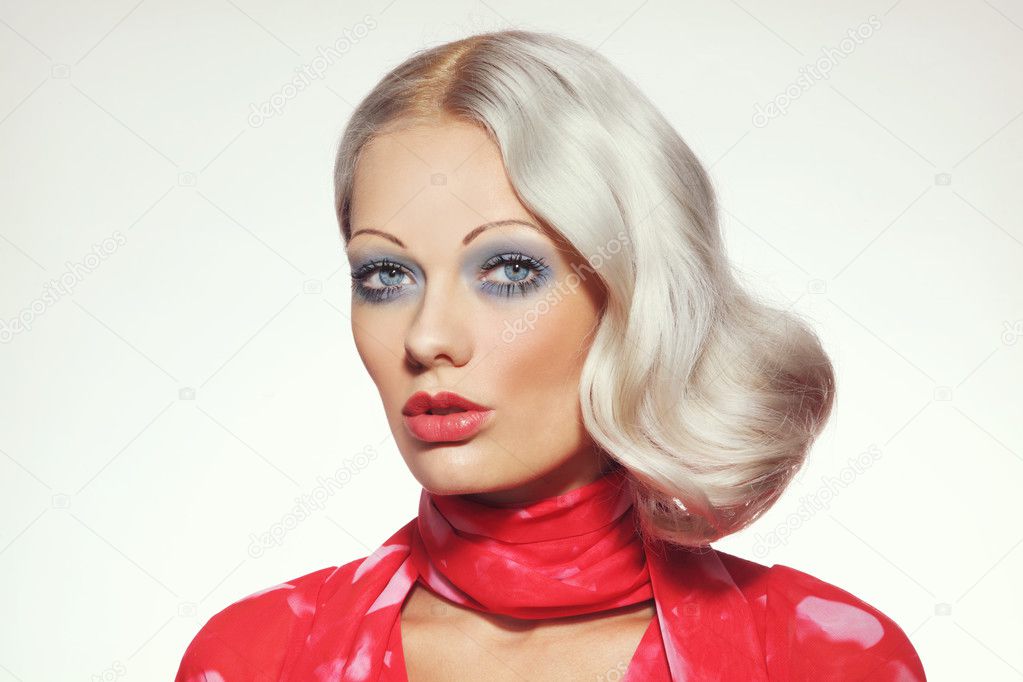 Young platinum blond woman with 70 makeup
