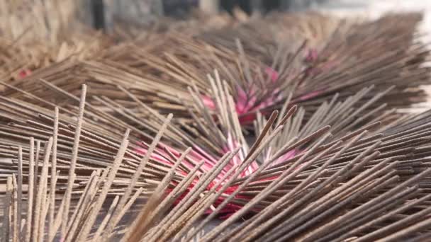 Newly made incense sticks are dried in the sun before being packed and sent to stores. Production manufacture of incense in Asia. Traditional art and Culture concept — Stock Video