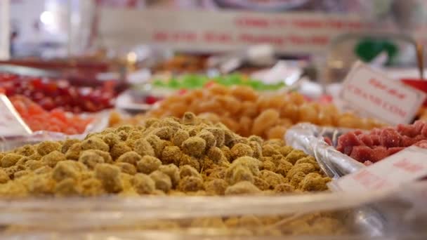 A lot of sweets in the local market. DALAT, VIETNAM - FEBRUARY 16, 2020 — Stock Video