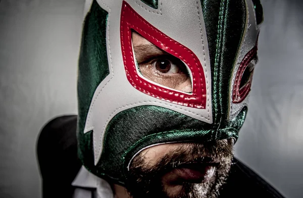 Angry businessman with mask of Mexican fighter — Stock Photo, Image