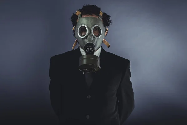 Businessman with gas mask — Stock Photo, Image