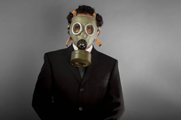 Businessman with gas mask — Stock Photo, Image