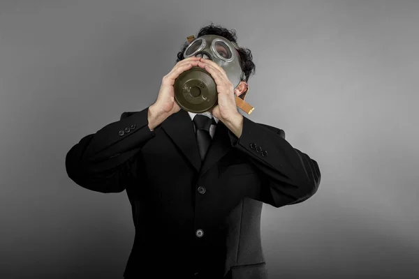 Businessman with gas mask — Stock Photo, Image