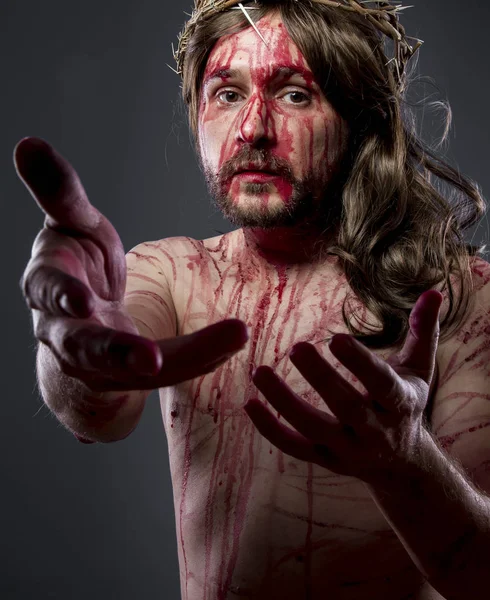 Jesus with the crown of thorns and blood on his body — Stock Photo, Image