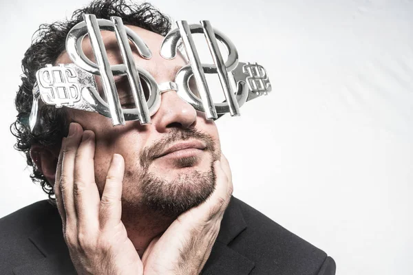 Businessman with dollar-shaped glasses — Stock Photo, Image