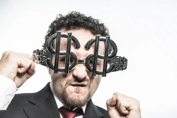 Бизнесмен в долларовых очках — стоковое фото