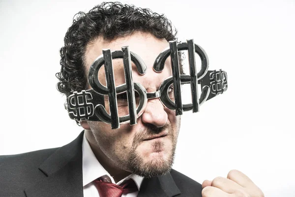 Hombre de negocios con gafas en forma de dólar — Foto de Stock