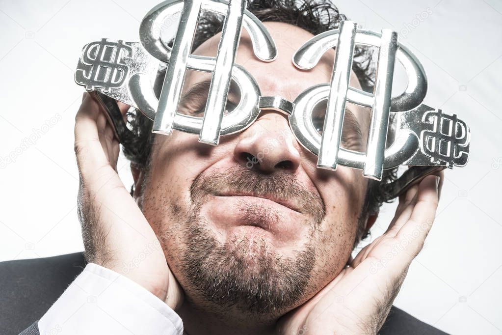 businessman with dollar-shaped glasses