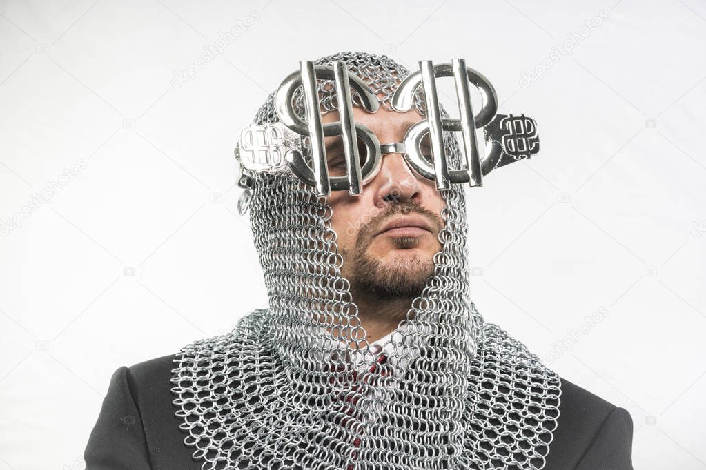 man with medieval chain mail and dollar-shaped glasses