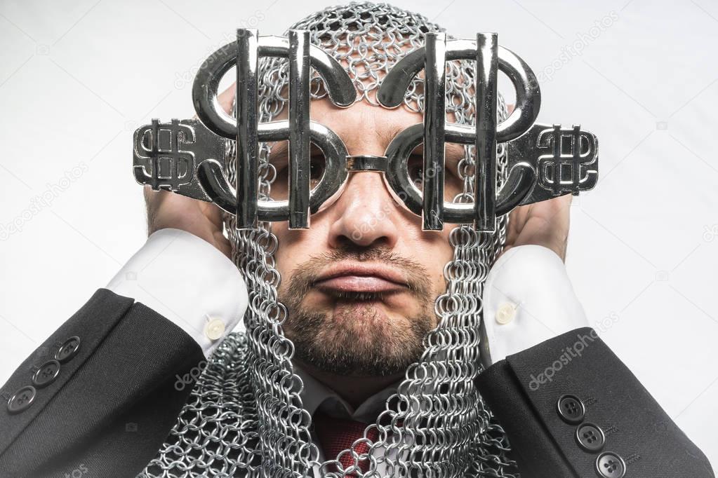 man with medieval chain mail and dollar-shaped glasses