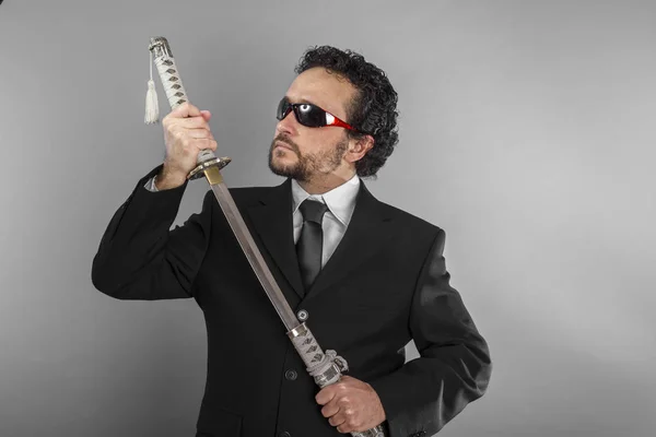 Aggressive lawyer with Japanese sword — Stock Photo, Image