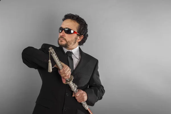 Aggressive lawyer with Japanese sword — Stock Photo, Image