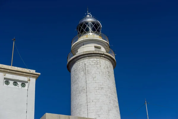 Formentor lighthouse on beach — Stock Photo, Image