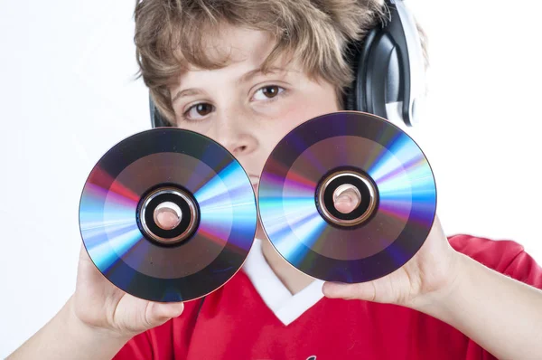 Boy with headphones holding dicks — Stock Photo, Image