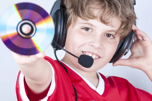 Boy with headphones holding dick — Stock Photo, Image