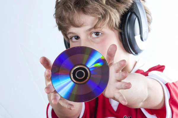 Boy with headphones holding dick — Stock Photo, Image