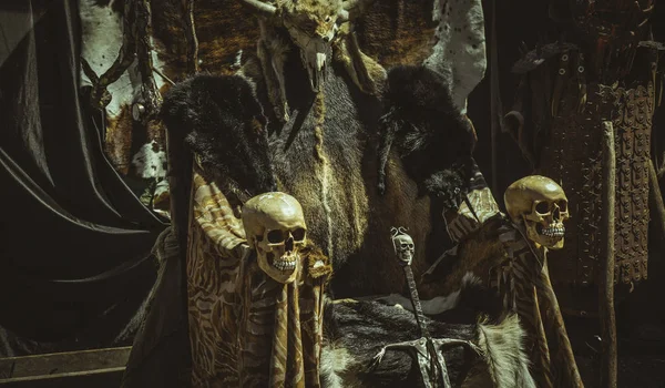 Throne of furs and skulls — Stock Photo, Image