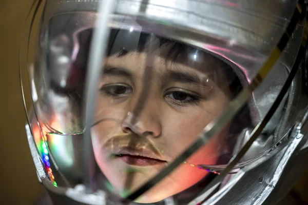 Boy playing to be an astronaut