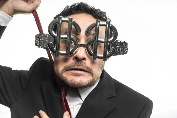 Homme d'affaires portant des lunettes avec des signes de dollar — Photo