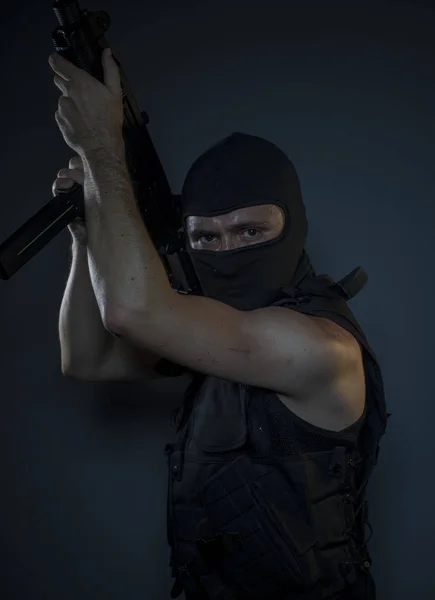 Terrorist in bulletproof vest and balaclava — Stock Photo, Image