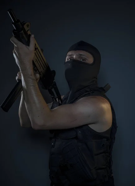 Terrorist in bulletproof vest and balaclava — Stock Photo, Image