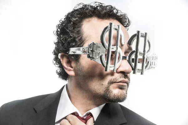 Businessman with glasses of dollar — Stock Photo, Image