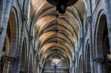 Medieval architectural arches inside the Cathedral of Ourense in Spain. Gothic style clipart