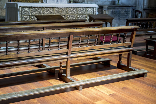 Chapel, benches to pray inside a church. concept of faith and religion