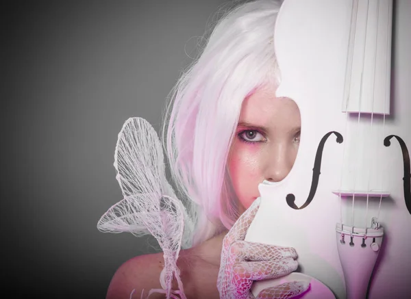 Symphony violinist, woman with string musical instrument in a white gothic style